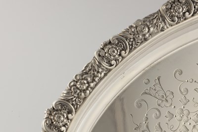 Lot 140 - A LARGE LATE 19TH CENTURY OVAL SILVER TWIN HANDLED TRAY