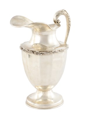 Lot 199 - A SILVER WATER PITCHER