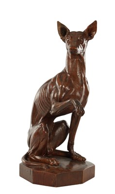 Lot 783 - A GOOD 19TH CENTURY CARVED WALNUT SCULPTURE OF A SEATED GREYHOUND
