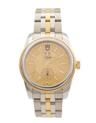Lot 1222 - A GENTLEMAN'S STEEL AND GOLD TUDOR GLAMOUR DOUBLE DATE AUTOMATIC WRIST WATCH