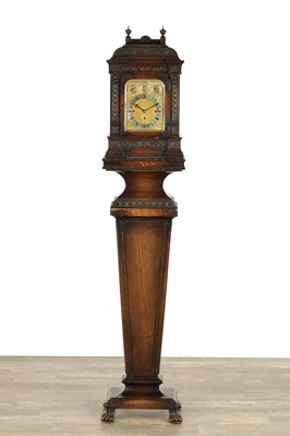 Lot 1363 - A LATE 19TH CENTURY OAK CASED TRIPLE FUSEE QUARTER CHIMING BRACKET CLOCK ON STAND