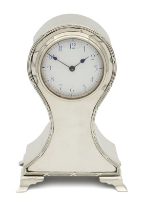 Lot 1386 - AN EDWARDIAN SILVER BALLOON CASED MANTEL CLOCK TIMEPIECE
