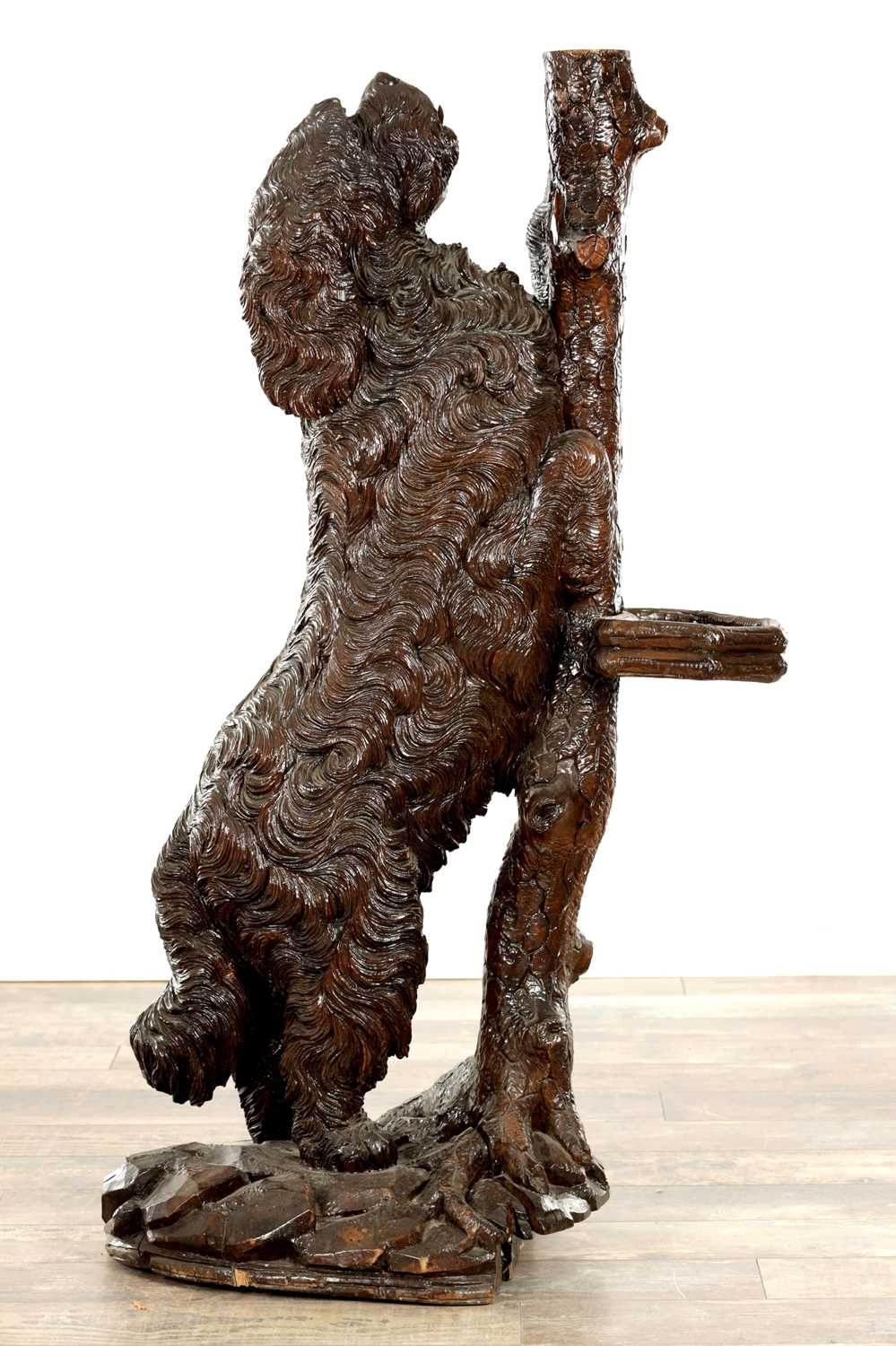 Lot 818 - A RARE 19TH CENTURY CARVED LINDEN WOOD BLACK FOREST STICK STAND FORMED A STANDING DOG