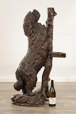 Lot 818 - A RARE 19TH CENTURY CARVED LINDEN WOOD BLACK FOREST STICK STAND FORMED A STANDING DOG