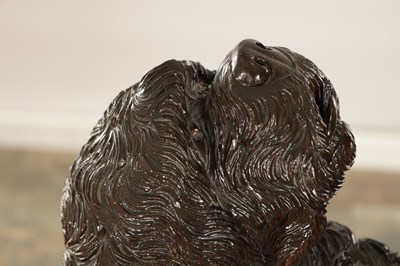 Lot 818 - A RARE 19TH CENTURY CARVED LINDEN WOOD BLACK FOREST STICK STAND FORMED A STANDING DOG
