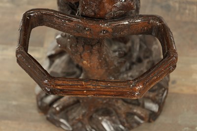 Lot 818 - A RARE 19TH CENTURY CARVED LINDEN WOOD BLACK FOREST STICK STAND FORMED A STANDING DOG