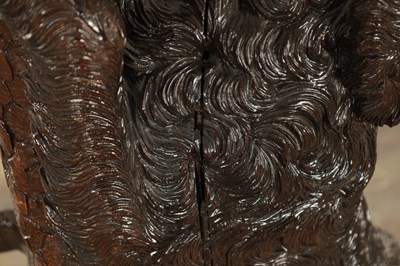 Lot 818 - A RARE 19TH CENTURY CARVED LINDEN WOOD BLACK FOREST STICK STAND FORMED A STANDING DOG