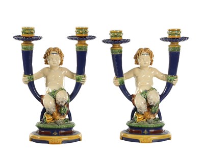 Lot 75 - A PAIR OF 19TH CENTURY MINTON MAJOLICA TWO BRANCH CANDELABRA