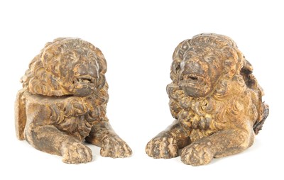 Lot 801 - A PAIR OF 17TH / 18TH CENTURY CARVED WALNUT LIONS