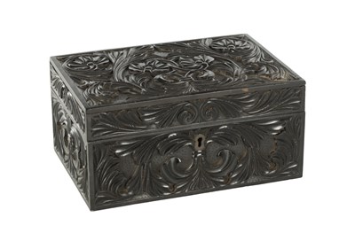 Lot 532 - A 19TH CENTURY CARVED EBONY CEYLONESE BOX