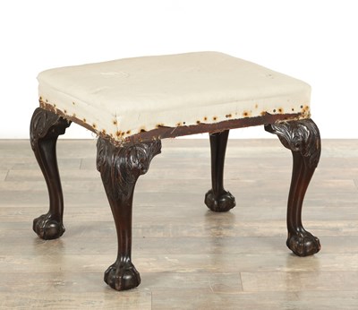 Lot 1619 - A GEORGE III MAHOGANY UPHOLSTERED STOOL
