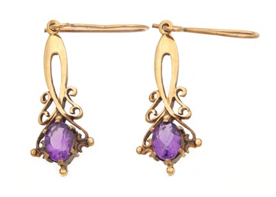 Lot 229 - A PAIR OF EARLY 20TH CENTURY 9CT GOLD AND AMETHYST EARRINGS