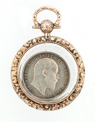 Lot 307 - A 20TH CENTURY 9CT GOLD LOCKET WITH COINS