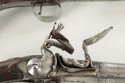 Lot 625 - WILSON, LONDON. A RARE PAIR OF 18TH CENTURY FLINTLOCK SILVER-MOUNTED 'QUEEN-ANNE' PISTOLS