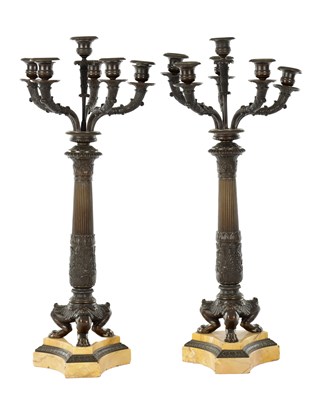 Lot 1094 - A PAIROF 19TH CENTURY REGENCY STYLE BRONZE AND MARBLE FIVE BRANCH CANDELABRA
