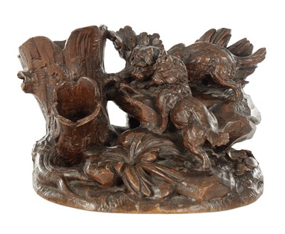 Lot 831 - A 19TH CENTURY CARVED BLACK FOREST SCULPTURE