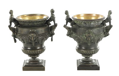 Lot 1062 - A PAIR OF 19TH CENTURY BRONZE REGENCY STYLE URNS
