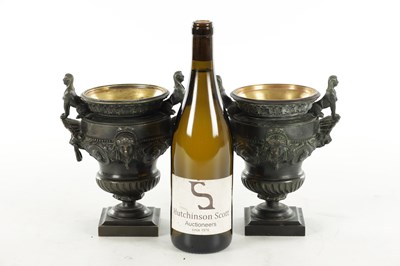 Lot 1062 - A PAIR OF 19TH CENTURY BRONZE REGENCY STYLE URNS