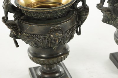 Lot 1062 - A PAIR OF 19TH CENTURY BRONZE REGENCY STYLE URNS