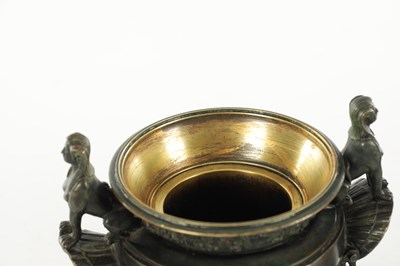 Lot 1062 - A PAIR OF 19TH CENTURY BRONZE REGENCY STYLE URNS
