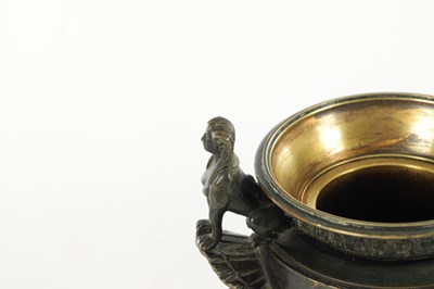 Lot 1062 - A PAIR OF 19TH CENTURY BRONZE REGENCY STYLE URNS