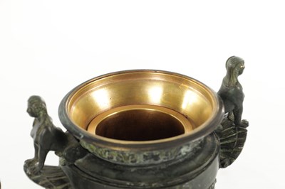 Lot 1062 - A PAIR OF 19TH CENTURY BRONZE REGENCY STYLE URNS