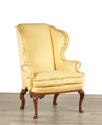 Lot 1517 - A 19TH CENTURY QUEEN ANNE STYLE WALNUT WINGBACK UPHOLSTERED ARMCHAIR