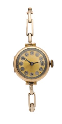 Lot 1240 - A LADIES' VINTAGE 9CT GOLD WRIST WATCH ON A 15CT GOLD BRACELET