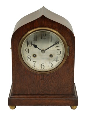 Lot 1766 - A LATE 19TH CENTURY OAK CASED MANTEL CLOCK