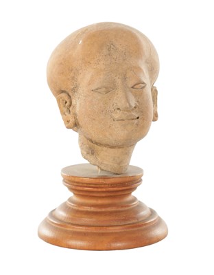 Lot 490 - AN 11TH–12TH CENTURY TERRACOTTA HEAD OF A MAJAPAHIT PRINCESS