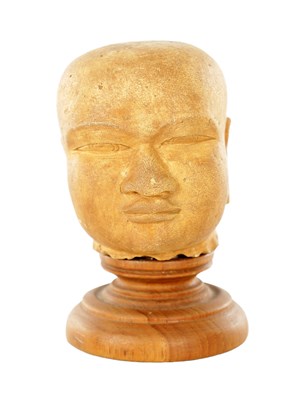 Lot 589 - A 11TH–12TH CENTURY SANDSTONE HEAD OF A MAJAPAHIT INFANT