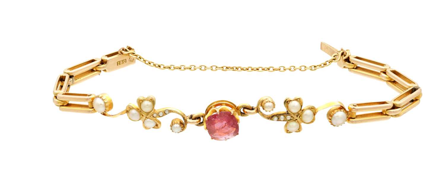 Lot 345 - A LATE VICTORIAN/EDWARDIAN 15CT GOLD PALE RUBY AND SEED PEARL BRACELET