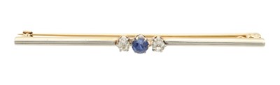 Lot 253 - A 14CT YELLOW AND WHITE GOLD TWO STONE DIAMOND AND SAPPHIRE TIE PIN