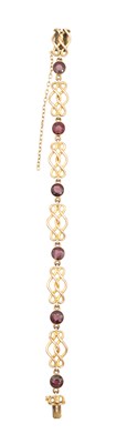 Lot 363 - A LATE VICTORIAN/EDWARDIAN HALLMARKED 9CT GOLD AND GARNET SET BRACELET