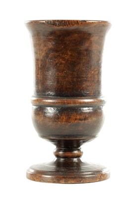 Lot 792 - AN 18TH CENTURY WALNUT TURNED TREENWARE GOBLET