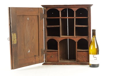 Lot 1662 - A GOOD EARLY 18TH CENTURY ELM HANGING SPICE CABINET