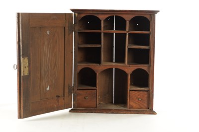 Lot 1662 - A GOOD EARLY 18TH CENTURY ELM HANGING SPICE CABINET