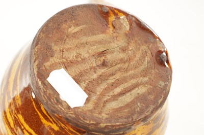 Lot 19 - AN EARLY 20TH CENTURY CLITHEROE SLIPWARE PUZZLE JUG
