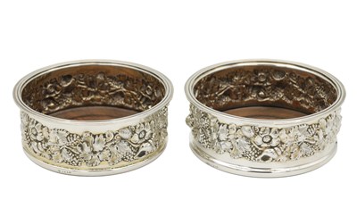 Lot 201 - A PAIR OF ELIZABETH II SILVER WINE BOTTLE COASTERS