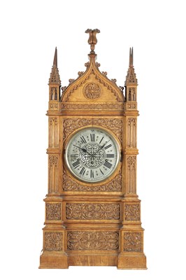 Lot 1288 - AN IMPRESSIVE 19TH CENTURY CARVED OAK GOTHIC THREE TRAIN FUSEE QUARTER STRIKING AND MUSICAL BRACKET CLOCK OF LARGE SIZE