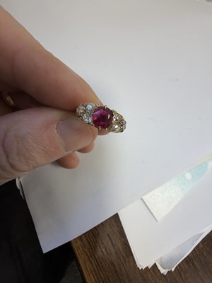 Lot 251 - A 15CT GOLD RUBY AND DIAMOND RING