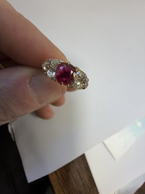 Lot 251 - A 15CT GOLD RUBY AND DIAMOND RING