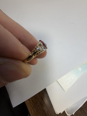Lot 251 - A 15CT GOLD RUBY AND DIAMOND RING