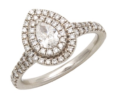 Lot 300 - A PLATINUM TEAR DROP DIAMOND RING