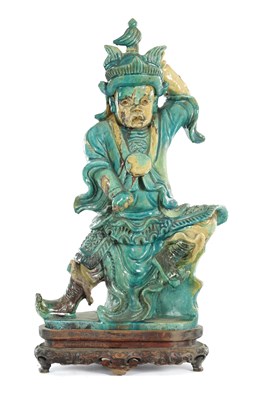 Lot 593 - A 19TH CENTURY CHINESE SHIWAN KILN ROOF TILE FIGURE