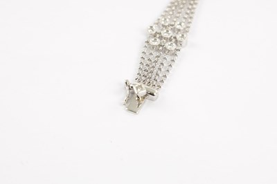 Lot 230 - AN 18CT WHITE GOLD DIAMOND SET BRACELET