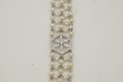 Lot 297 - A 15CT WHITE GOLD PEARL AND DIAMOND CHOKER NECKLACE