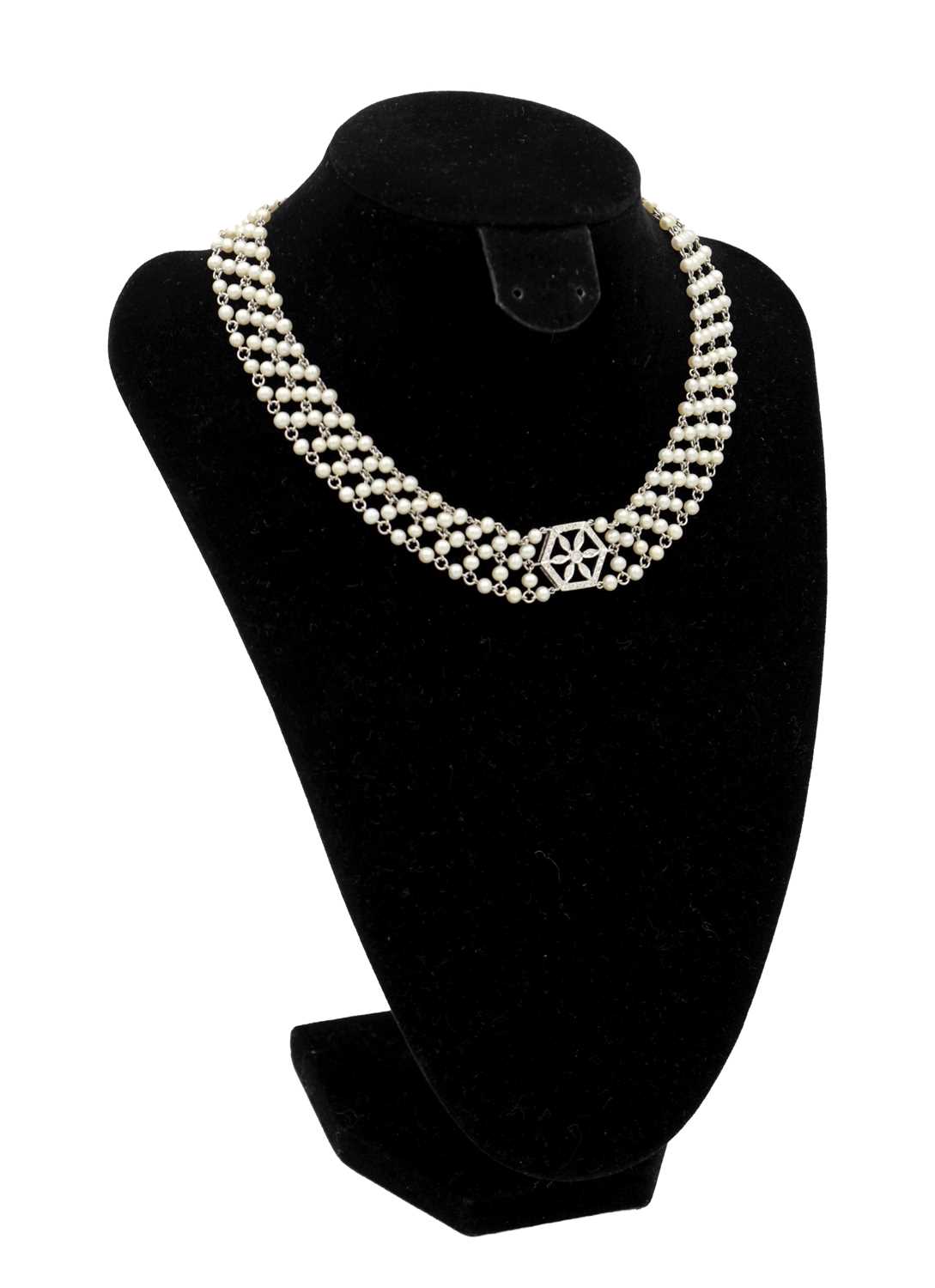 Lot 297 - A 15CT WHITE GOLD PEARL AND DIAMOND CHOKER NECKLACE