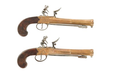 Lot 613 - WHEELER. A GOOD PAIR OF EARLY 19TH CENTURY BRONZE FRAMED BOXLOCK BLUNDERBUSS PISTOLS WITH UNDER FLICK BAYONETS