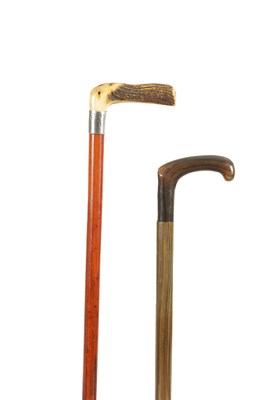 Lot 864 - A 19TH CENTURY SYSTEM PENNY WHISTLE CANE WITH AN EARLY 20TH CENTURY PATENTED BAKELITE COMPARTMENT CANE